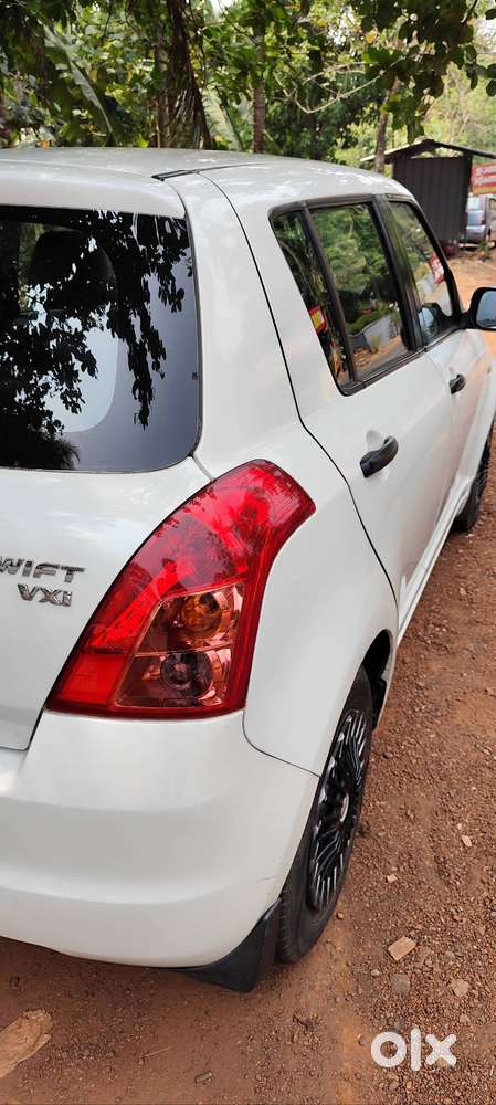 Swift Vxi White Colour