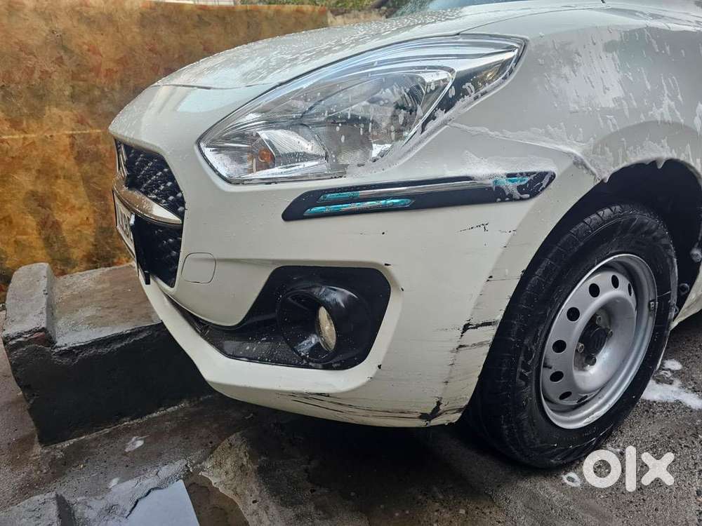 Swift , 2022, Petrol , White Color , 23200km Driven ,