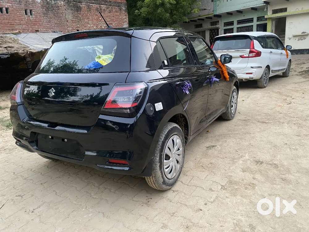 Maruti Suzuki Swift Vxi 2026