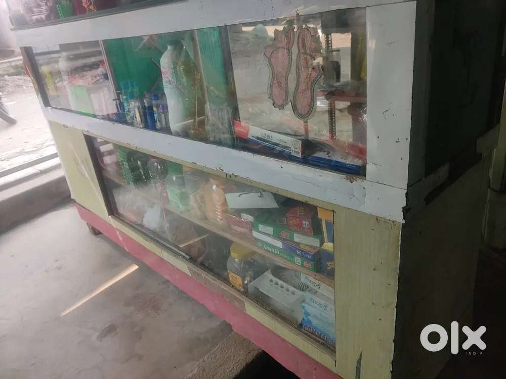 wooden raks, and counter, with stationery items and gift