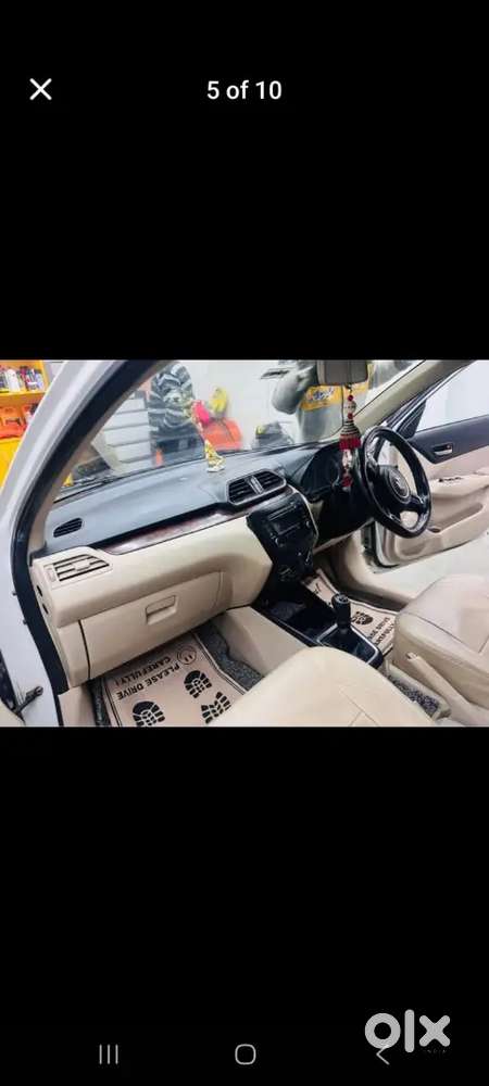 साफ सुथरी गाड़ी है वाइट कलर नया वाला मॉडल है डीजल