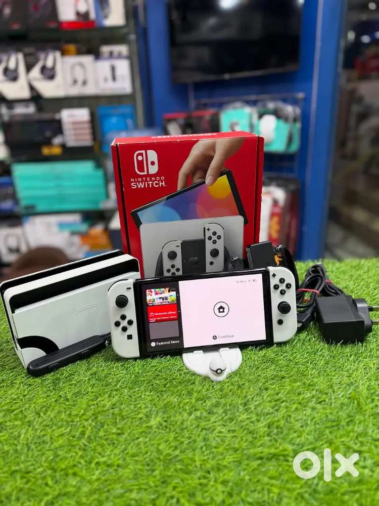 Nintendo Switch OLED Handheld Gaming - Games & Entertainment in