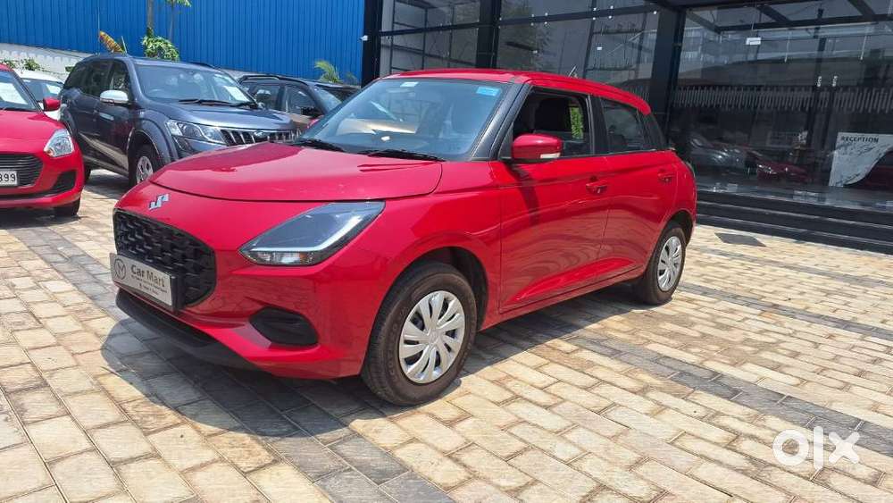 Maruti Suzuki Swift Vxi + Manual, 2026
