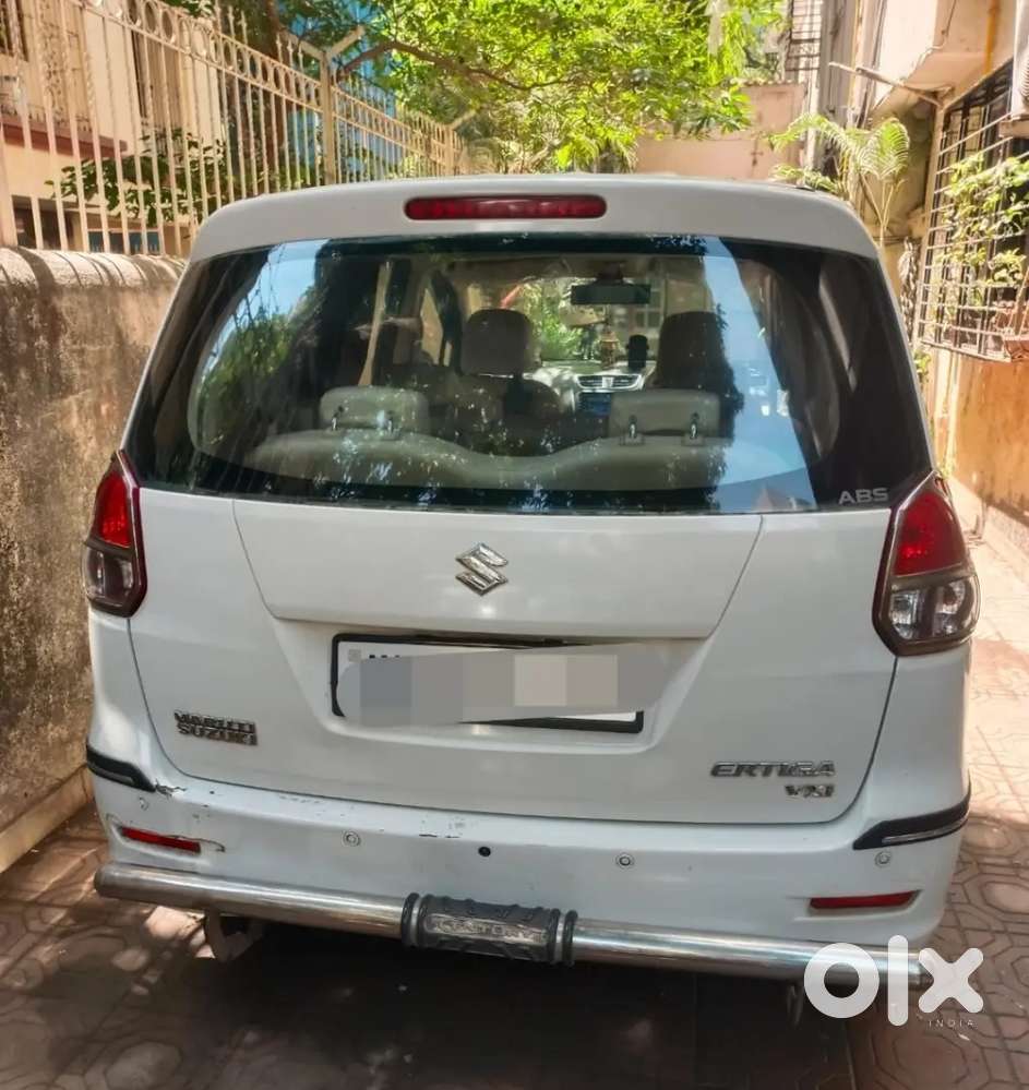 1owner Ertiga Vxi White Color