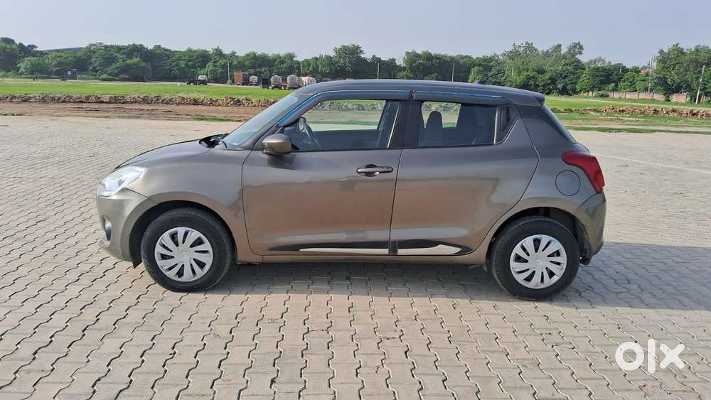 Maruti Suzuki Swift 1.2 Lxi (o), 2023, Petrol
