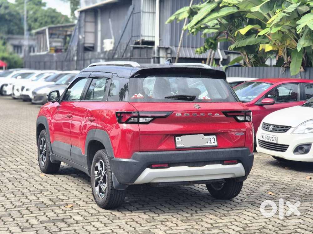 Maruti Suzuki Brezza 1.5 Zxi Plus Smart Hybrid Dual Tone, 2023, Petr..