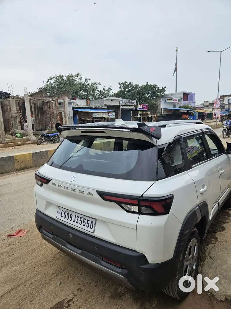 Maruti Suzuki Brezza 1.5 Lxi Hybrid 2024