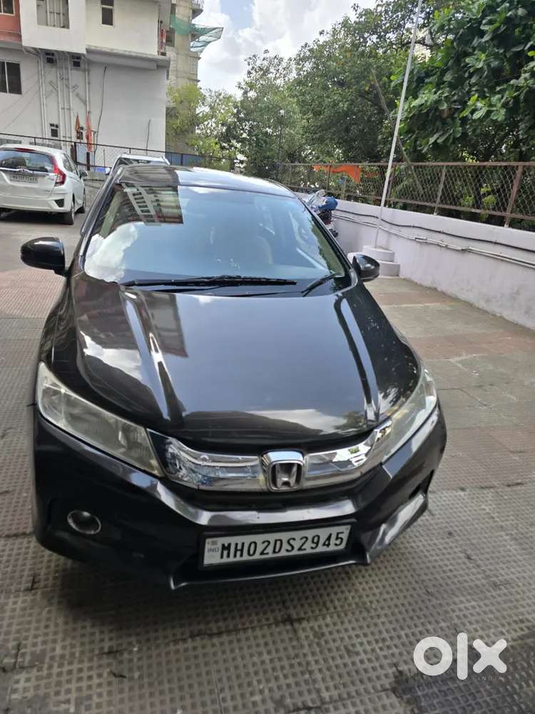 *honda City 
*1.5 Sv Mt(idtech)  1.5 S Mt
* 2014
* 9.3 K
* G Brown M
*