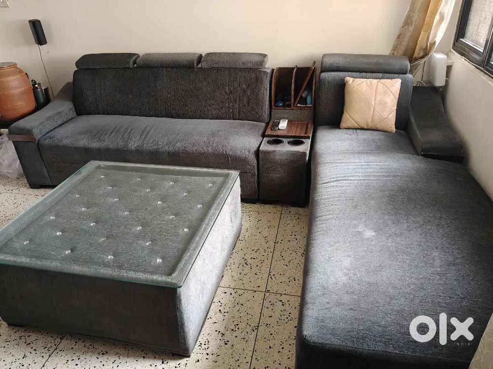 L Shape Sofa with Chaise and book shelf Excellent Condition.