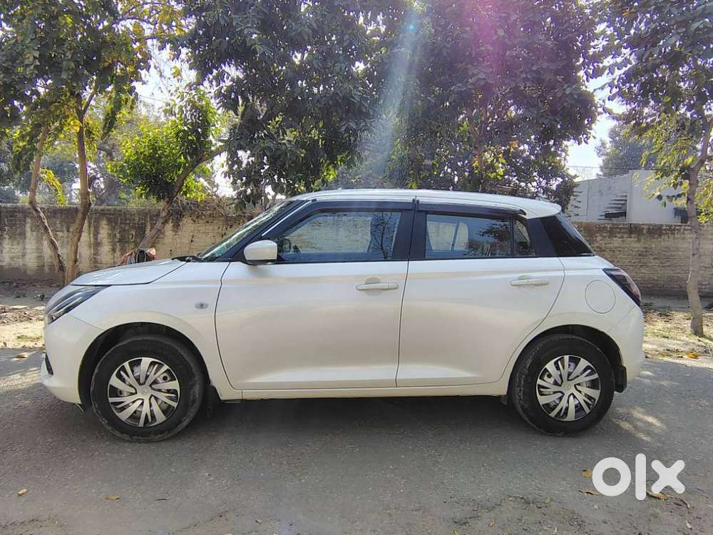 Maruti Suzuki Swift Lxi Optional-o, 2024, Petrol
