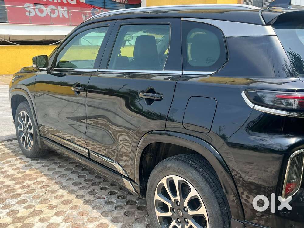 Maruti Suzuki Grand Vitara 1.5 Zeta Plus Dual Tone Intelligent Hybri..