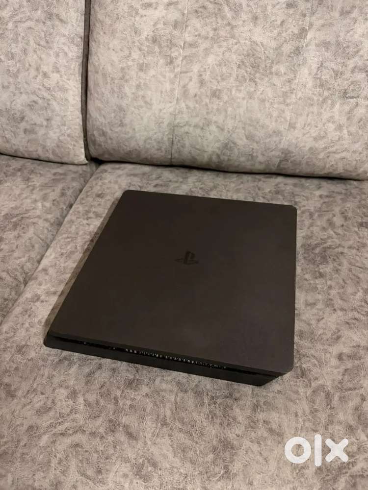 PlayStation 4 slim 1 TB with dual shock 4 controller
