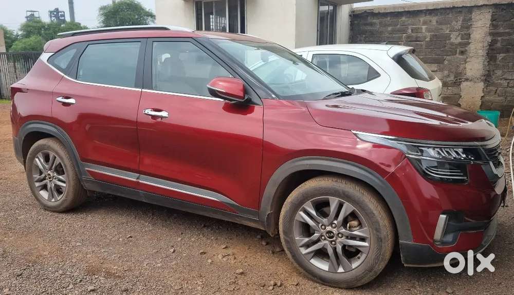 Red Kia Seltos Driven 1,39,000 Km. Excellent Condition