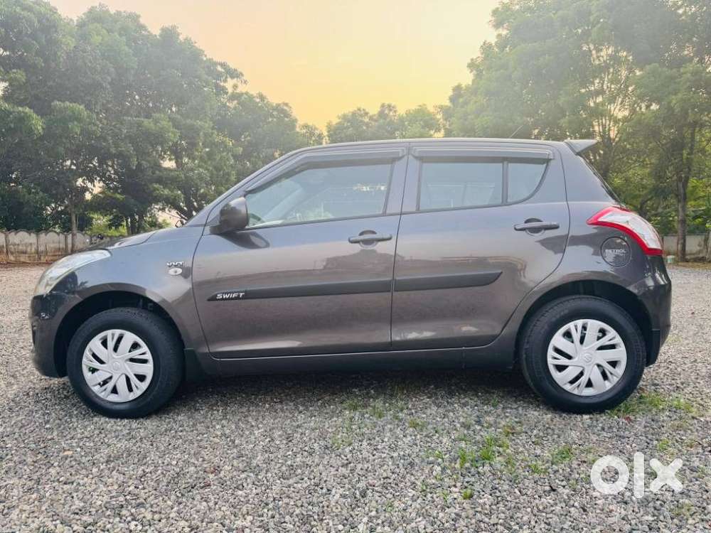 Maruti Suzuki Swift Lxi Optional-o, 2017, Petrol