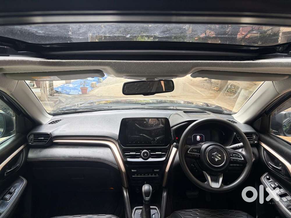 Maruti Suzuki Grand Vitara 1.5 Zeta Plus Dual Tone Intelligent Hybri..