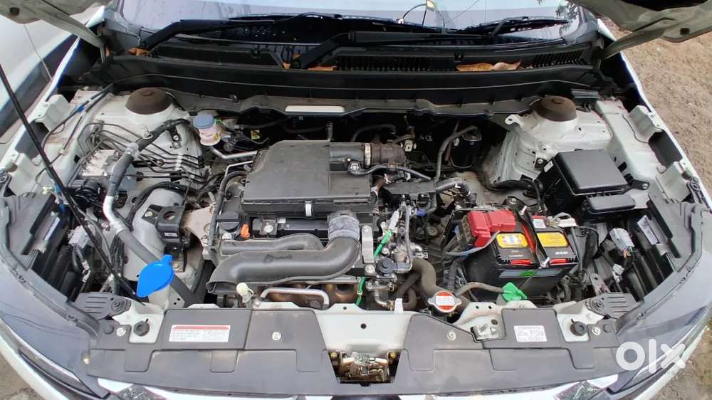 Maruti Suzuki Brezza Vxi 2024