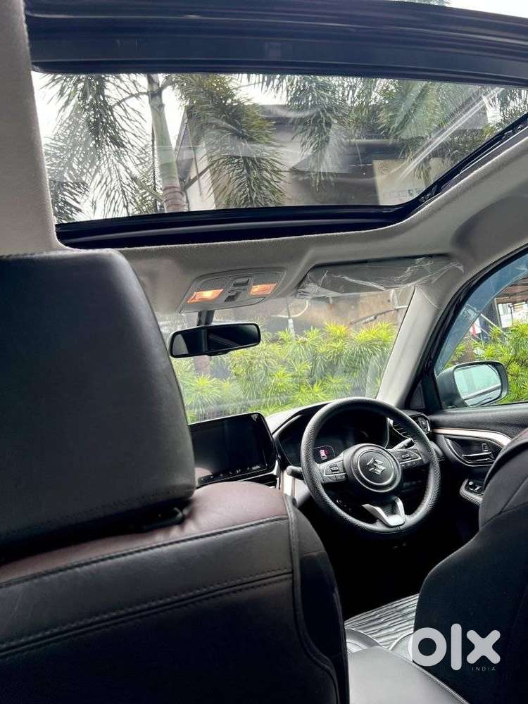Maruti Suzuki Grand Vitara 1.5 Zeta Plus Dual Tone Intelligent Hybri..