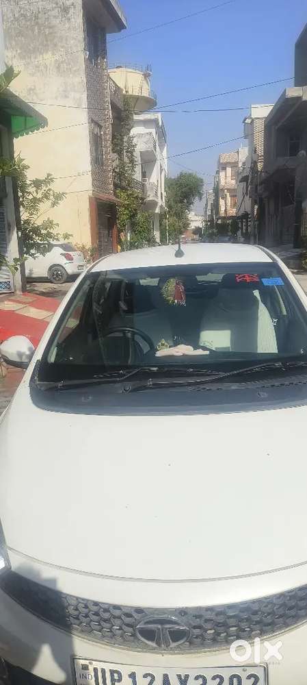 Tata Tiago Xz Car One Hand Driving And Well Maintained