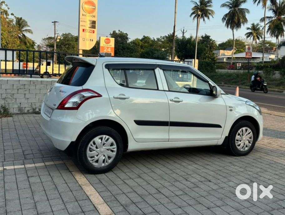 Maruti Suzuki Swift Lxi Optional-o, 2015, Petrol