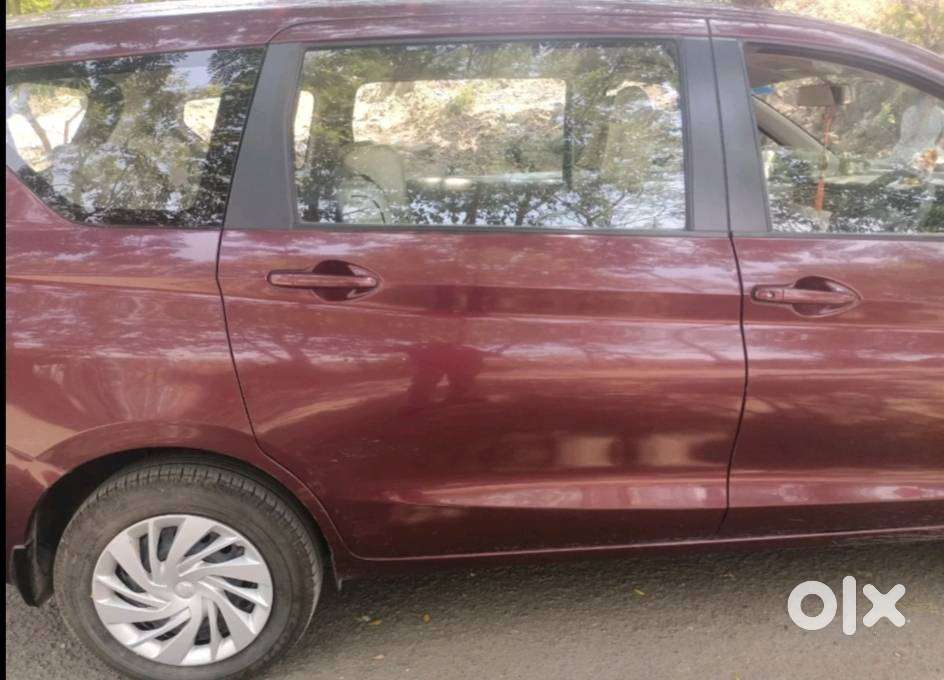Ertiga Smart Hybrid Vxi (o) , Colour -prme. Auburn Red