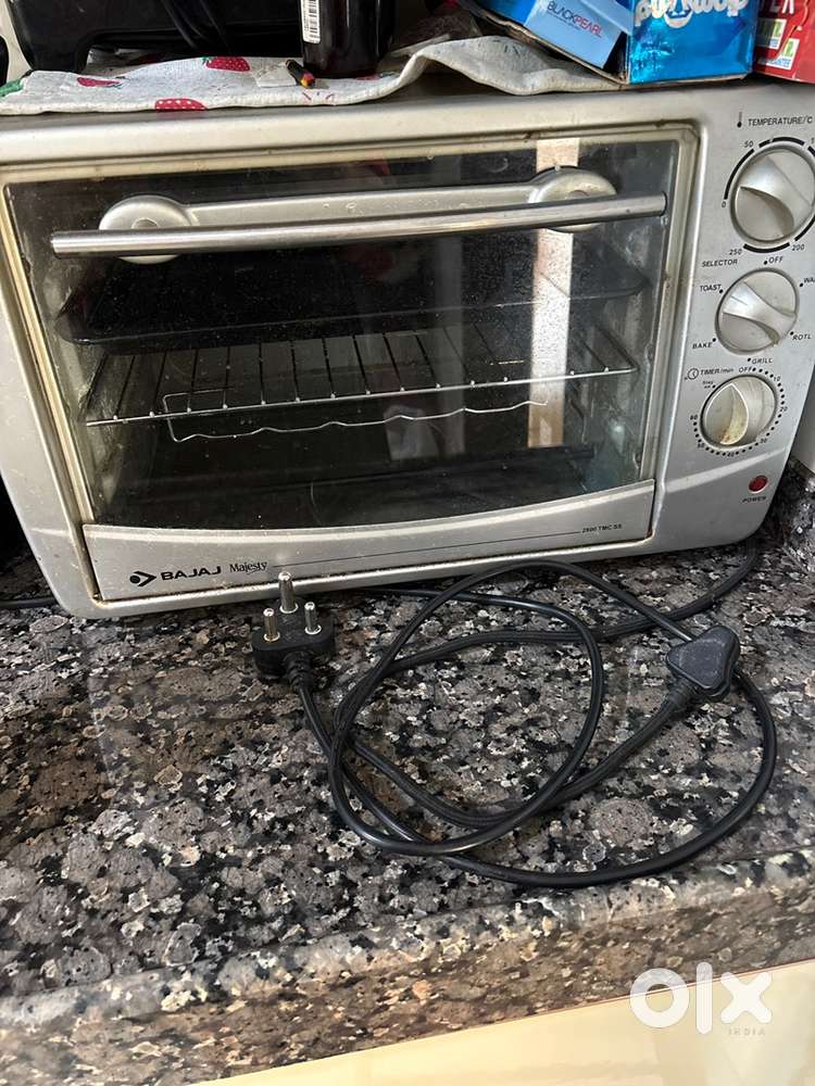 Moving out saleBajaj otg oven with all attachments