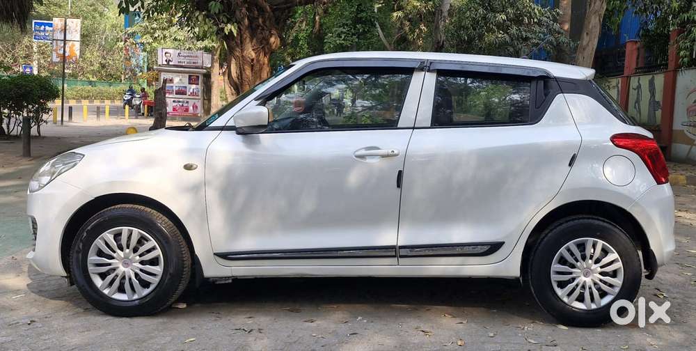 Maruti Suzuki Swift Lxi Optional-o, 2019, Petrol