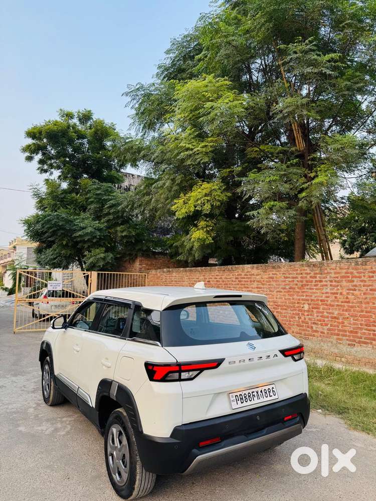 Maruti Suzuki Brezza 1.5 Lxi Smart Hybrid, 2025, Petrol