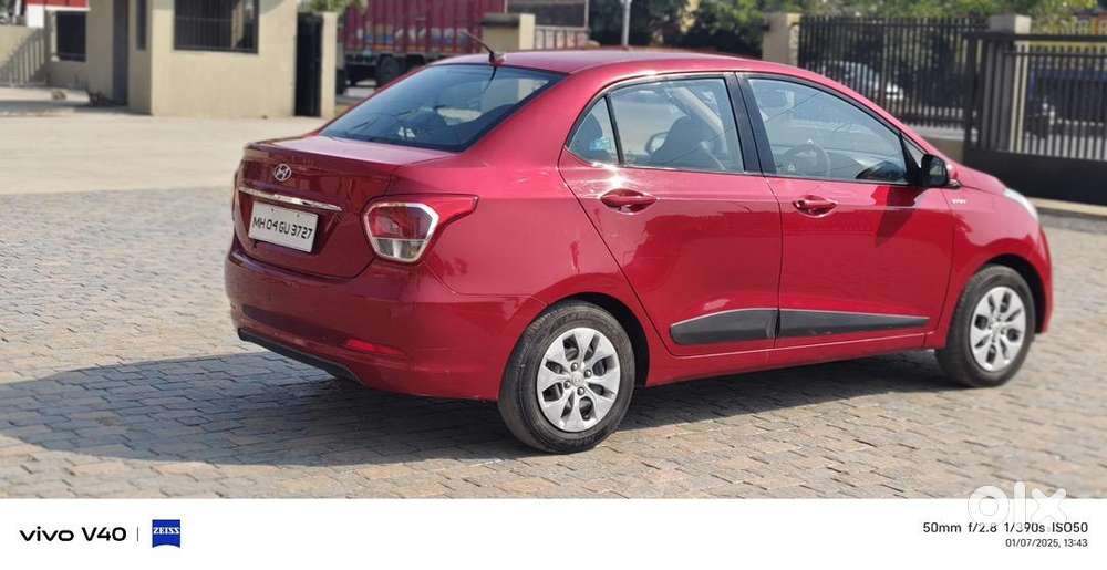 Red Colour Hyundai Xcent 2015 Petrol In Very Good Condition