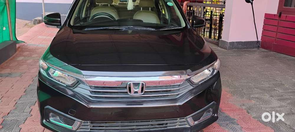 Honda Amaze Golden Brown Automatic Car, First Owner  In Good Condition