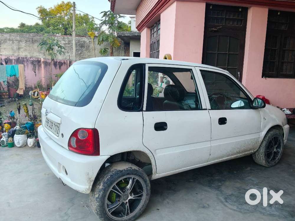 White Colour Zen In Good Condition With Modified Allow Wheel And Tyres