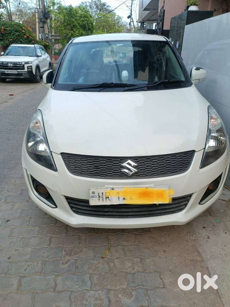 Swift Petrol 2015 Pearl White
