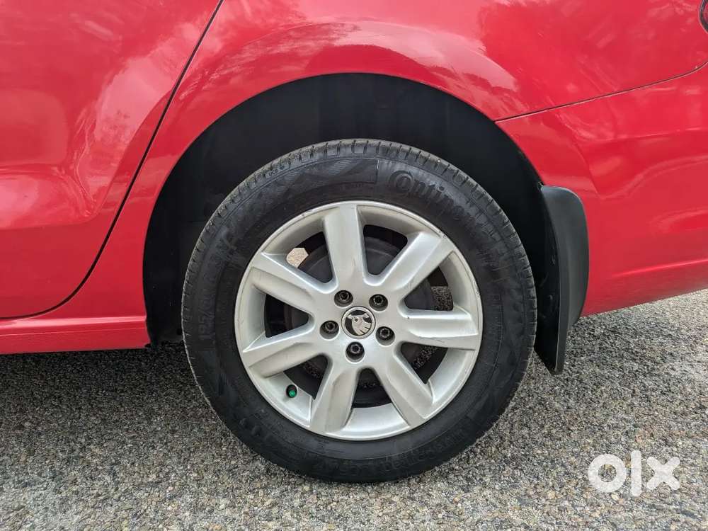 Skoda Rapid 2014 ,red Colour ,diesel Well Maintained