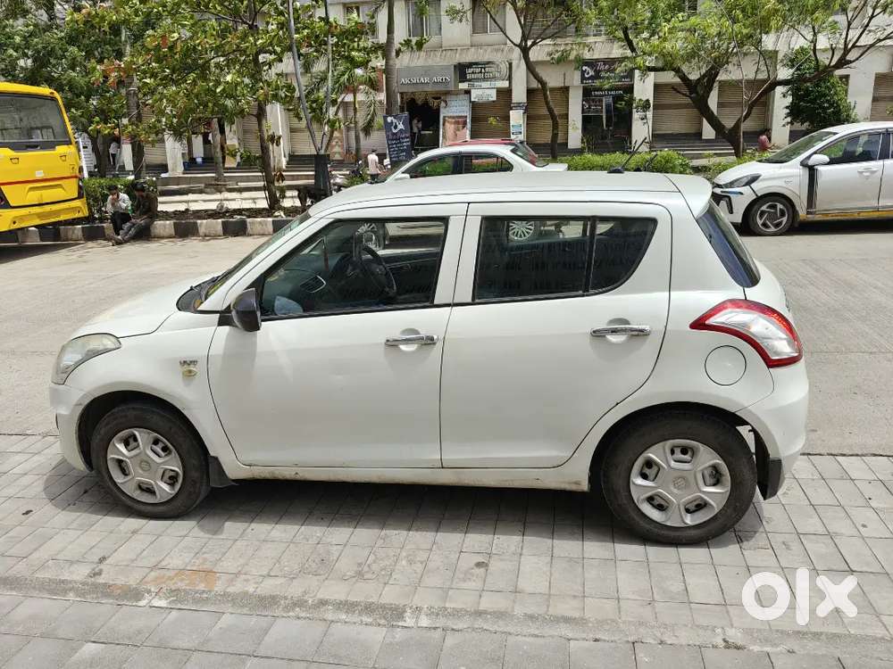 Maruti Suzuki Swift Lxi 2015
