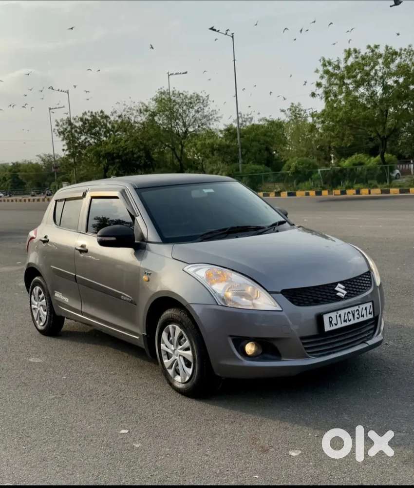 Maruti Suzuki Swift Lxi 2014