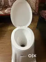 Portable plastic commode seat