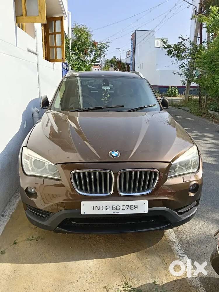 Bmw X1 2015  Rs.12,50,000/-  Registration Brown Colour 2nd Owner
