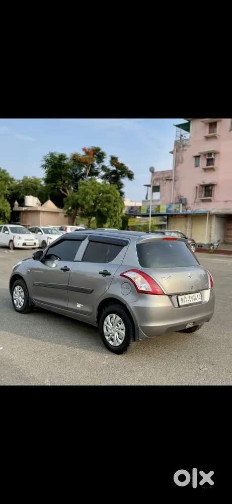 Maruti Suzuki Swift Lxi 2014