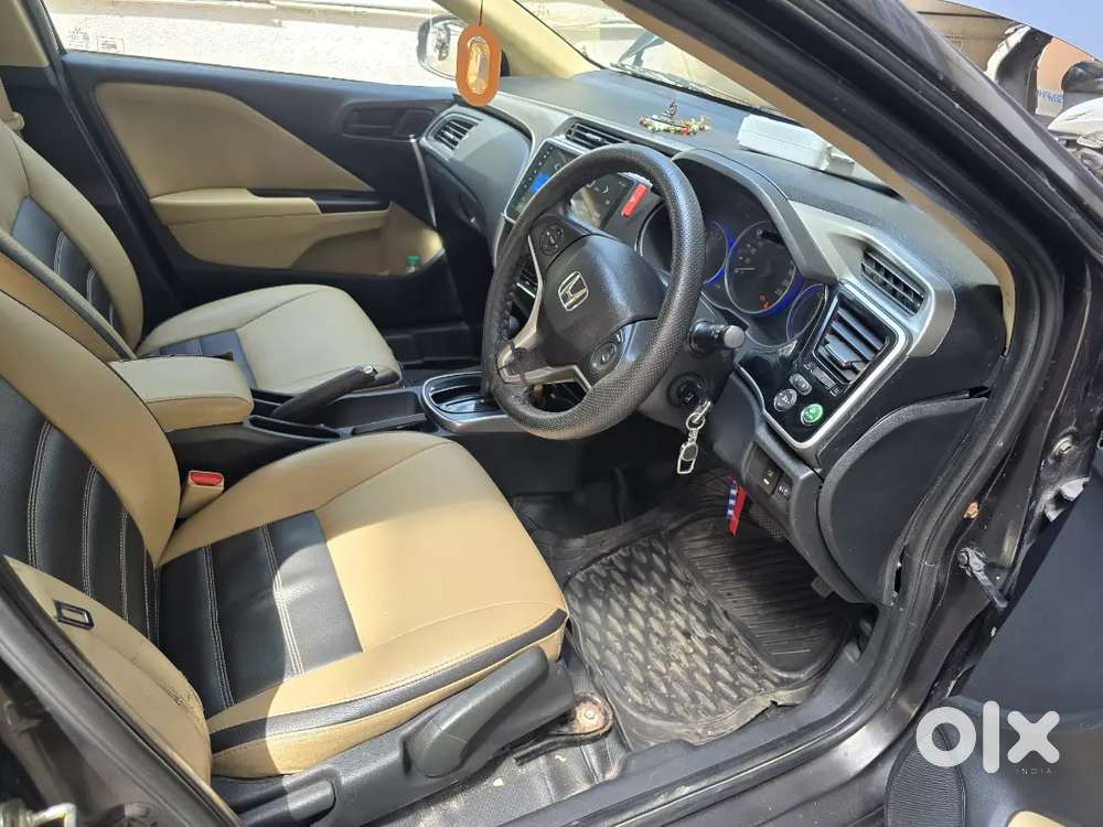 *honda City 
*1.5 Sv Mt(idtech)  1.5 S Mt
* 2014
* 9.3 K
* G Brown M
*