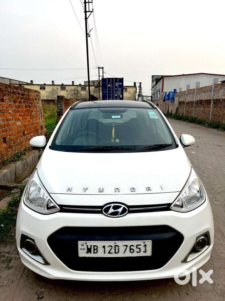 Hyundai Grand I10 1.2 Sportz  2016  42000 Km  First Owner  White