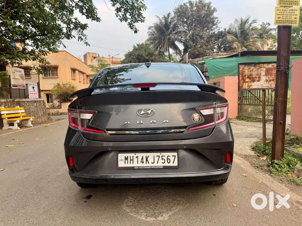 Hyundai Aura Cng Top Model
