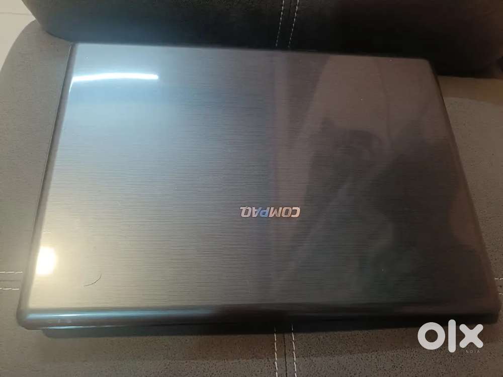 | (2010)Model HP COMPAQ laptop | |WOODEN furniture table |