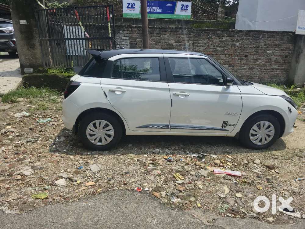 Maruti Suzuki Swift Vxi 2026