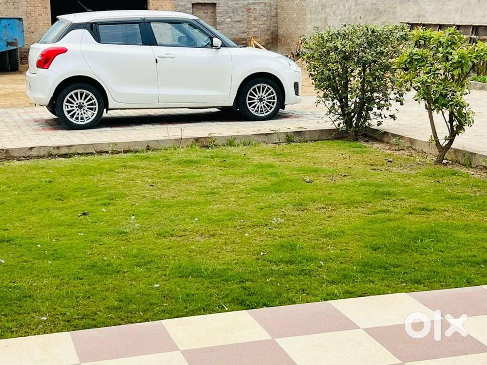  Maruti Suzuki Swift Vxi 2022  Pearl White  First Owner