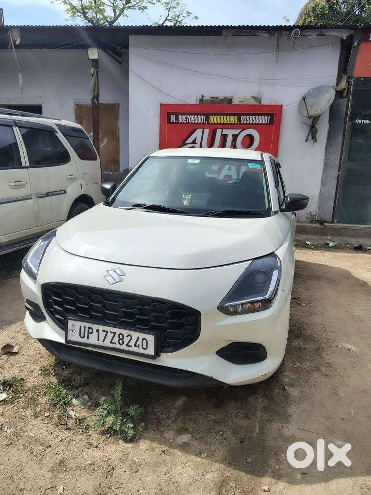 Maruti Suzuki Swift 1.2 Lxi (o), 2024, Petrol
