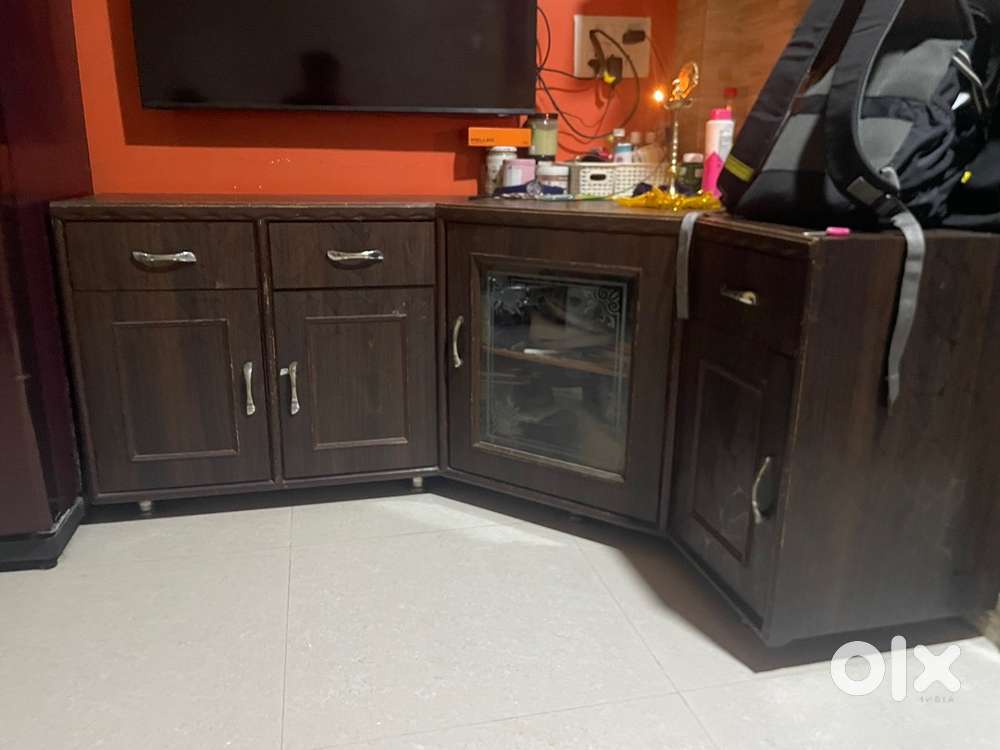 L shape storage under TV set
