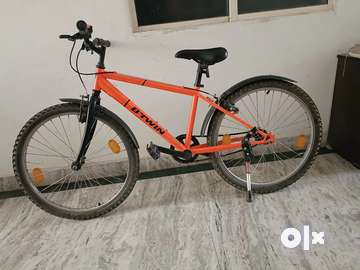 Btwin best sale bike orange