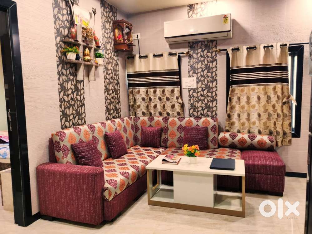 5 seater maroon sofa with 1seat puffy & 5pillow