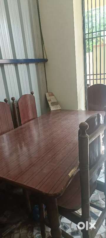 Used dining table discount set on olx