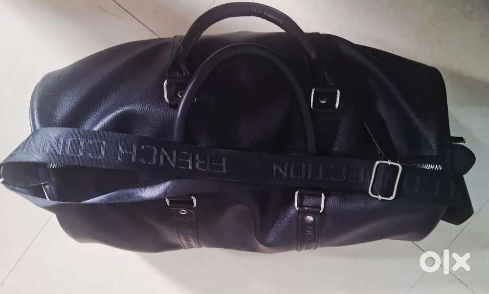 Selling a brand new faux leather travel bag in black which is from an