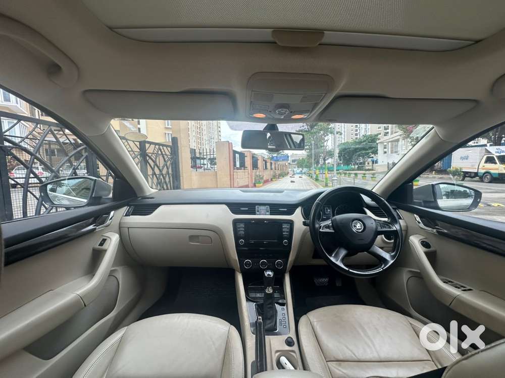 2015 Skoda Octavia Petrol Automatic Elegance, Sunroof, 2nd Own, 56k Km